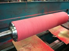 Nylon non-woven mill roll being dressed in our facility