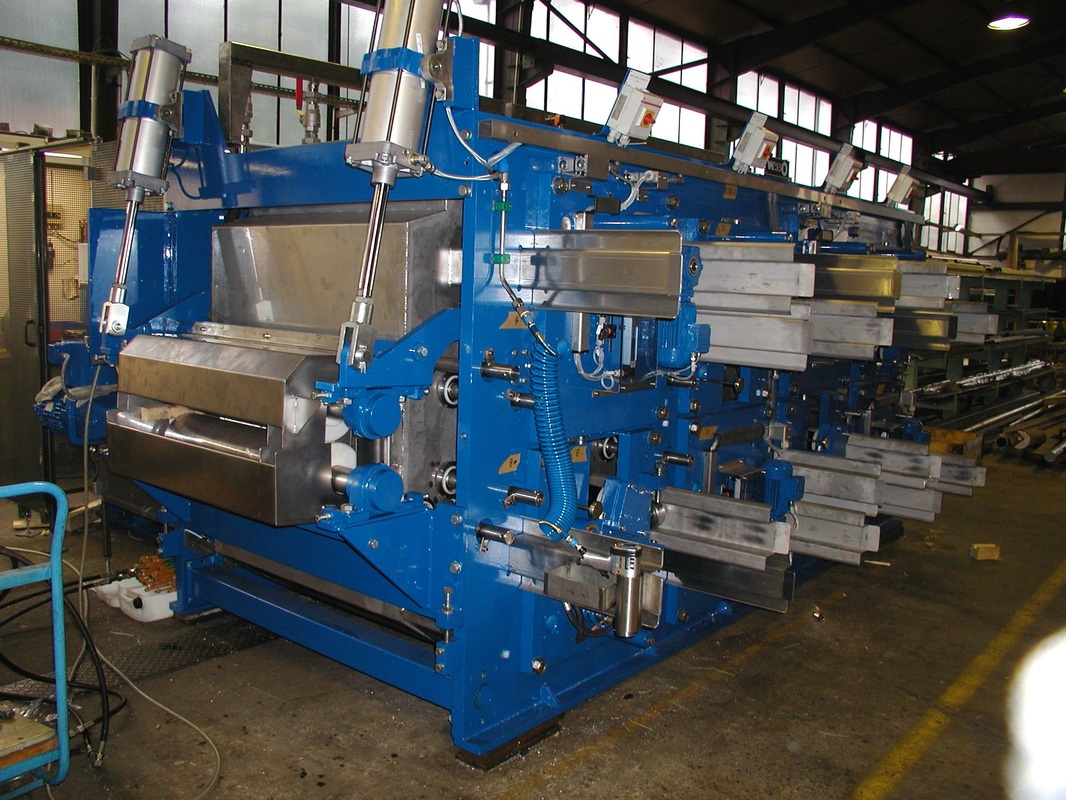 Flat Metal strip brush machine for cleaning and finishing wide strip metal with abrasive and/or non-abrasive brushes to clean copper, steel, stainless steel, aluminum, titanium, and other special alloys