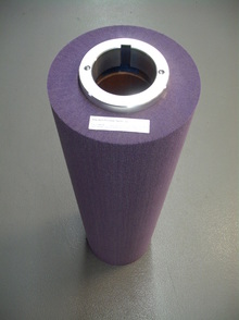 Picture of impregnated non-woven abrasive flap brush with custom flange for copper cleaning and deoxidizing