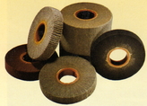 Non-woven abrasive disc material
