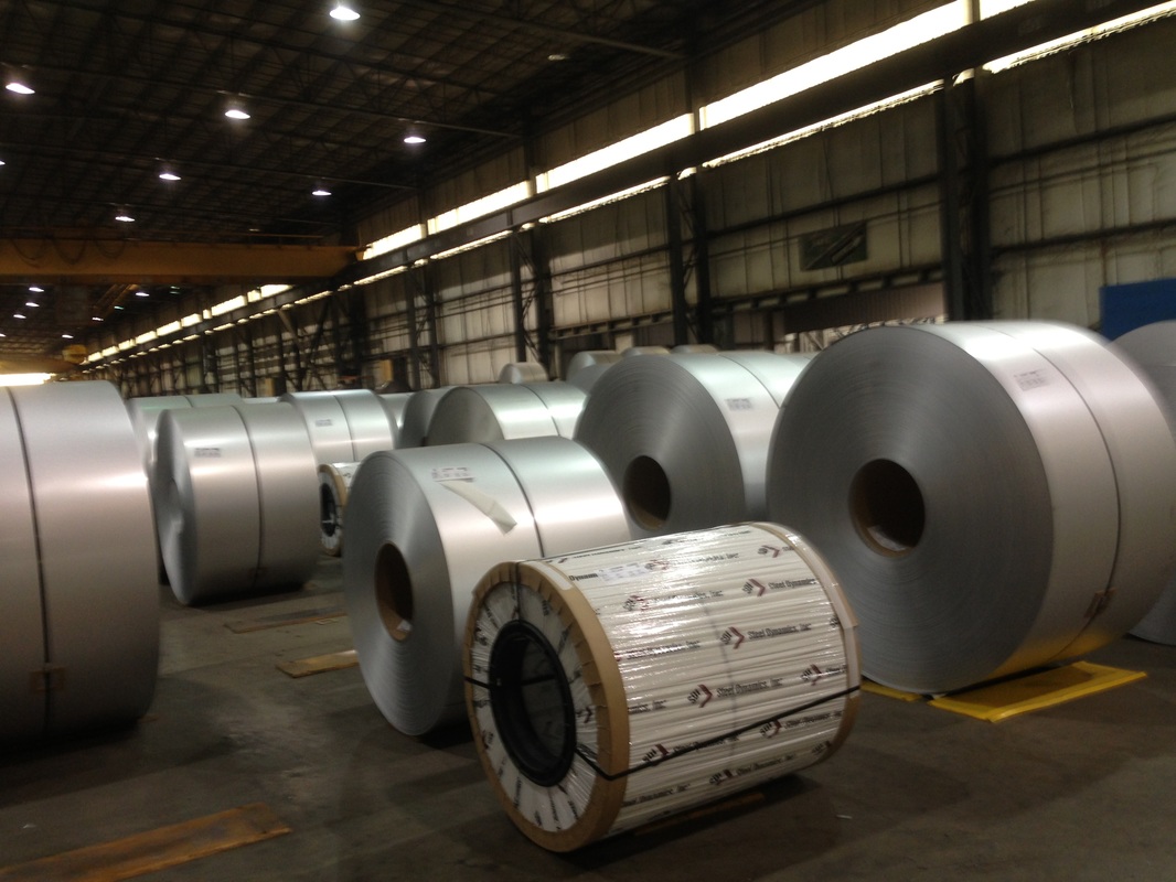 Picture of steel strip coils waiting to be processed